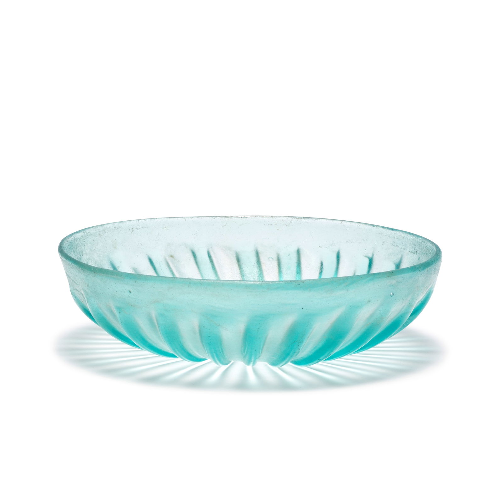 A Roman pale blue-green glass ribbed bowl (1 of 1)