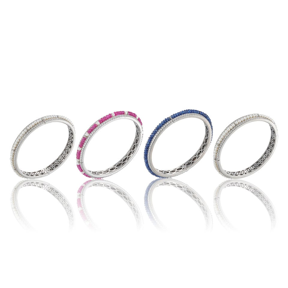 FOUR CULTURED PEARL, GEM-SET AND DIAMOND BANGLES (4): FOUR CULTURED PEARL, GEM-SET AND DIAMOND BANGLES 養殖珍珠、彩色寶石及鑽石手鐲四枚 Diamonds: approx. 12.4