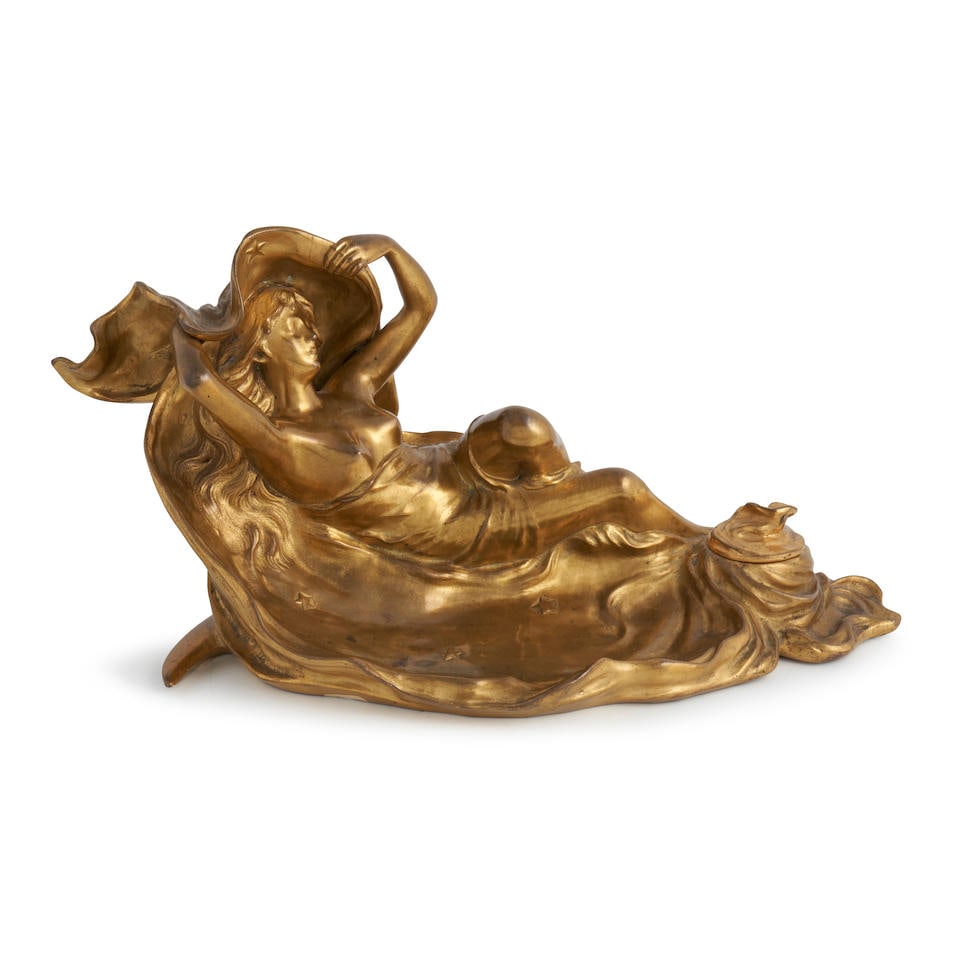 JEAN GARNIER (1853-1910) 'L'AUBE' FIGURAL INKWELL France, c. 1900, gilt bronze, signed 'J. Garni...: JEAN GARNIER (1853-1910) 'L'AUBE' FIGURAL INKWELL France, c. 1900, gilt bronze, signed 'J. Garnier,' ht. 7 1/2, lg. 14, dp. 6 3/4 in. Footnotes: Provenance: Danenberg S.A., Louvre des Antiquaires, Par