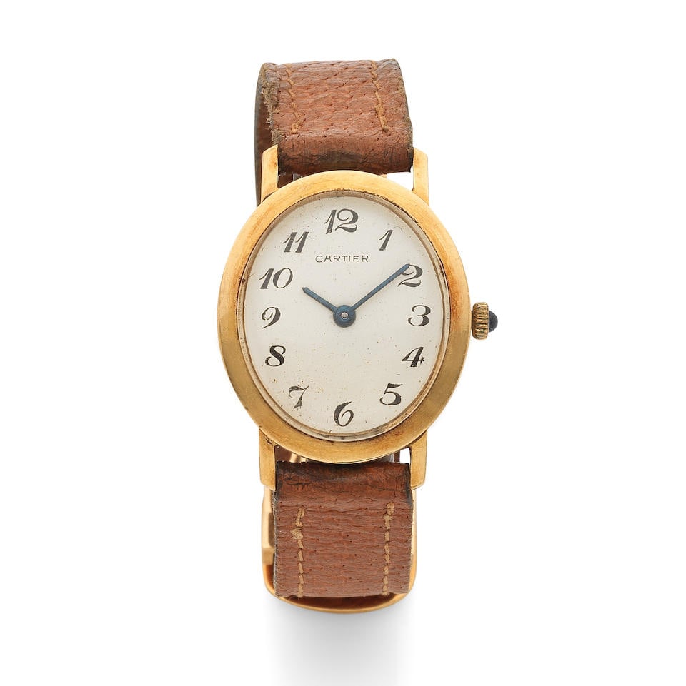 Cartier. A lady's 18K gold manual wind wristwatch Cartier. Montre bracelet de dame en or jaune 1... (1 of 4)