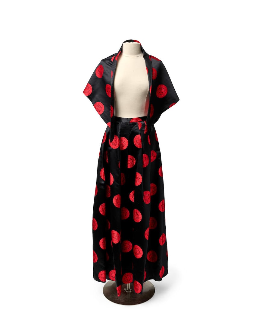 AN ADOLFO RED AND BLACK PRINT SILK ENSEMBLE (This skirt was worn to the Council of Fashion Desig... (1 of 1)