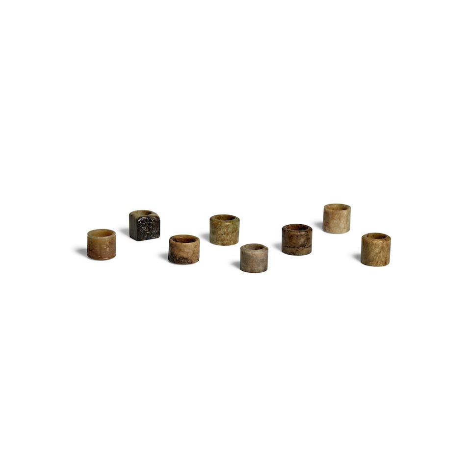 SIX PLAINE JADE AND TWO CARVED ARCHER'S THUMB RINGS  Qing Dynasty  (8) (1 of 2)