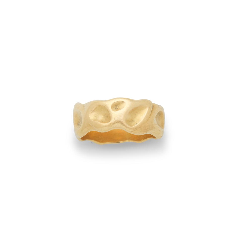 GRIMA: GOLD RING,: GRIMA: GOLD RING, 1975 18 carat gold Signed Grima, maker's mark AGLtd, UK hallmark Ring size approx. R Weight approx. 11.0g Footnotes: OVERALL CONDITION Some surface wear to the 18 carat gold. Inner h