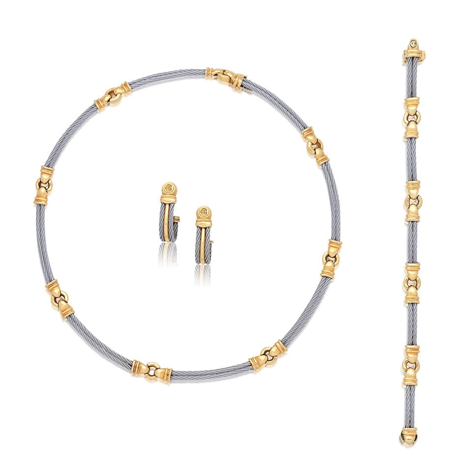 CHARRIOL: BICOLOURED EARRINGS, NECKLACE AND BRACELET SUITE (3): CHARRIOL: BICOLOURED EARRINGS, NECKLACE AND BRACELET SUITE Signed Charriol Lengths: earrings 2.6cm, bracelet 18.0cm, necklace 42cm Total weight approx. 58.0g (3) Footnotes: OVERALL CONDITION Light sur