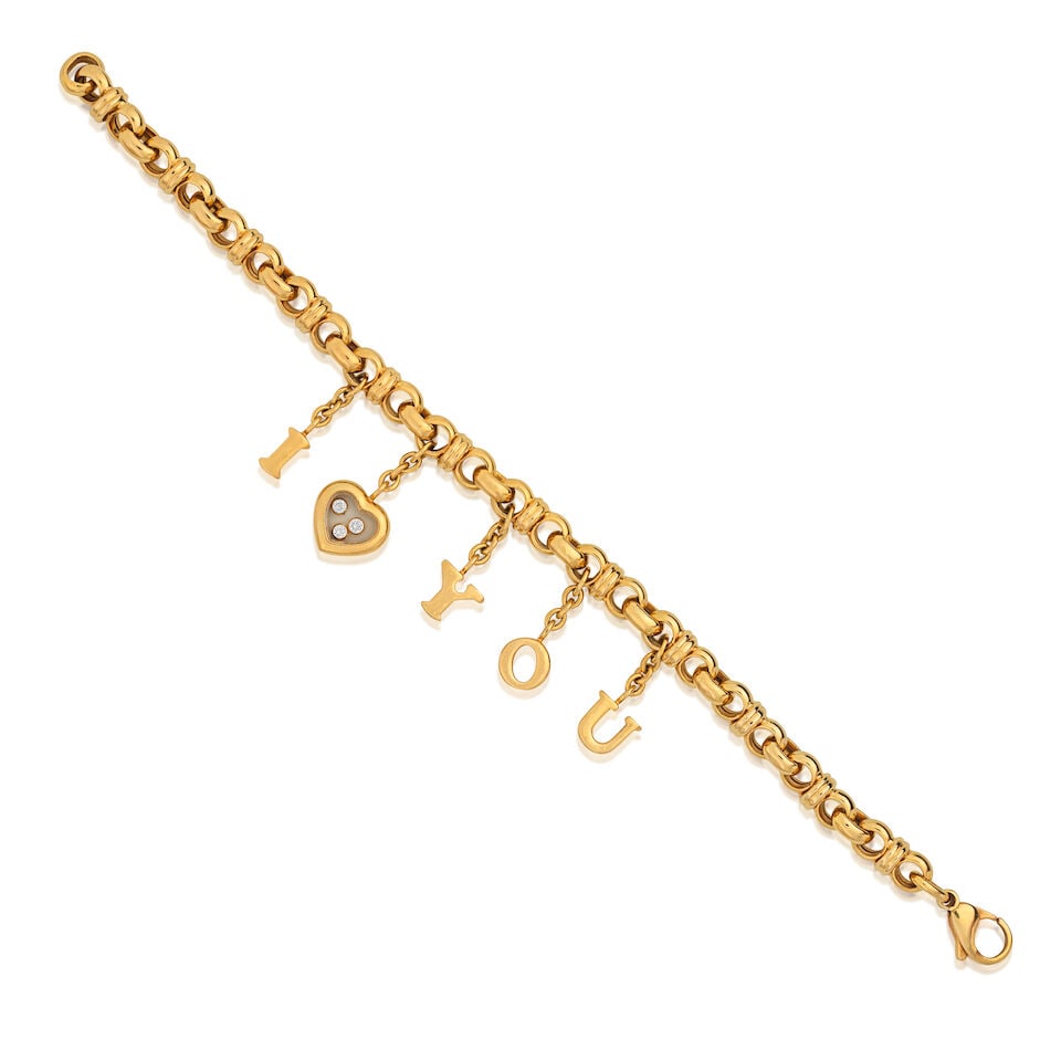 CHOPARD: 'HAPPY DIAMONDS' CHARM BRACELET: CHOPARD: 'HAPPY DIAMONDS' CHARM BRACELET Brilliant-cut diamonds Signed Chopard, maker's mark, numbered Length 20.5cm Weight approx. 35.5g Footnotes: OVERALL CONDITION Clasp stamped with 750. Glazed co