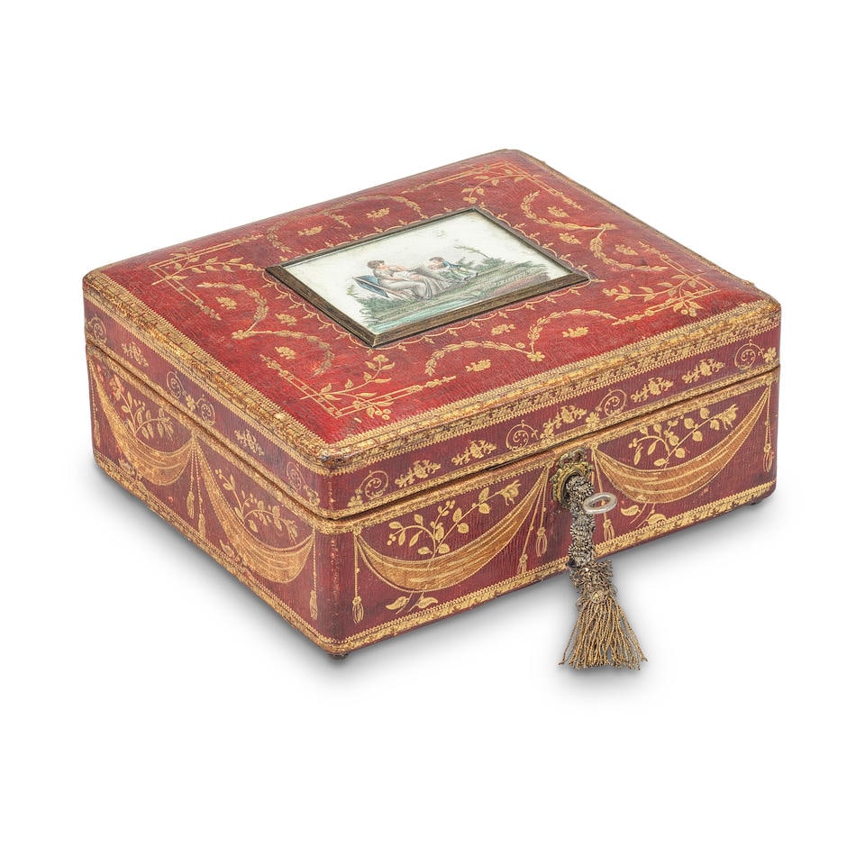 An early 19th century gilt tooled red Morocco leather jewellery box,: An early 19th century gilt tooled red Morocco leather jewellery box, The lid inset with a coloured stipple engraving of a mother and child, with maroon velvet lined interior, 8.7cm high, 20cm wide, 17