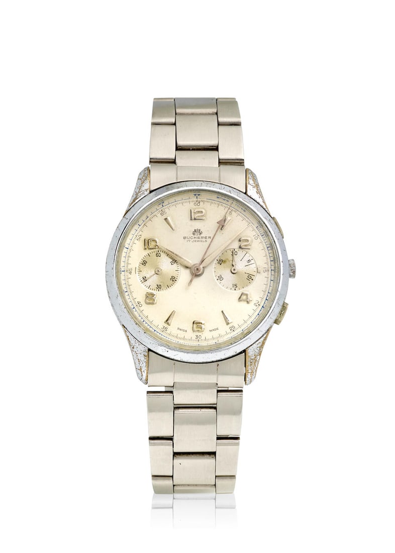 [NO RESERVE] BUCHERER. A STAINLESS STEEL MANUAL WIND CHRONOGRAPH BRACELET WATCHRef: 8056.1, c. 1950: [NO RESERVE] BUCHERER. A STAINLESS STEEL MANUAL WIND CHRONOGRAPH BRACELET WATCH Reference: 8056.1 Date: c. 1950 Movement: Jeweled manual wind Dial: White Case: Round, snap on case back Strap/Bracelet: