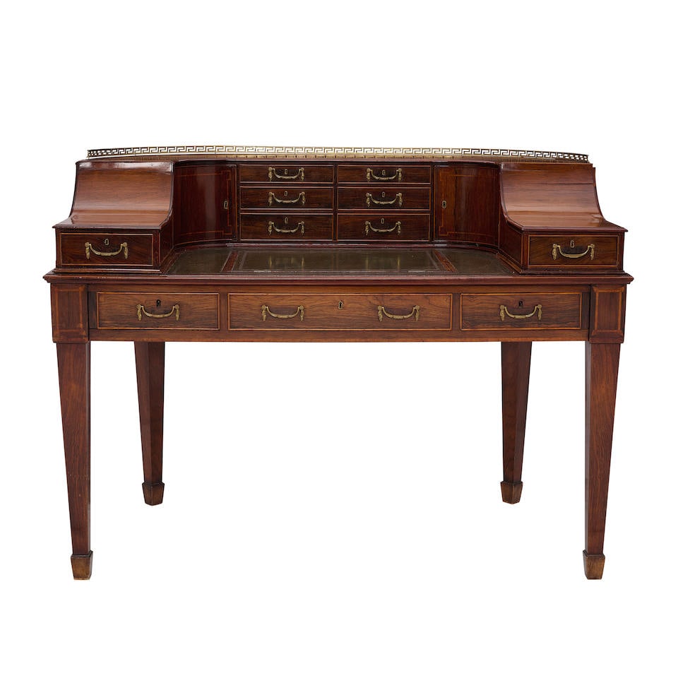 A REGENCY BRASS MOUNTED LEATHER INSET MAHOGANY CARLTON HOUSE DESKEarly 19th century (1 of 3)