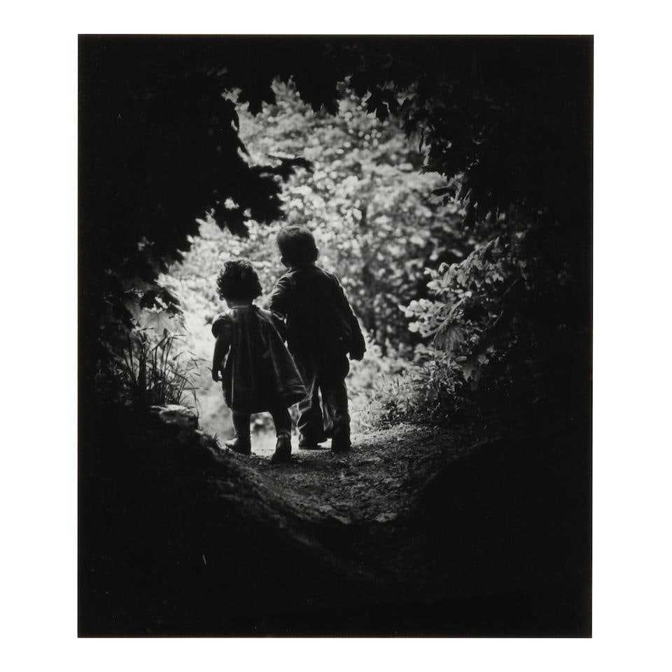 W. Eugene Smith (1918-1978); 'Walk to Paradise Garden';: W. Eugene Smith (1918-1978) 'Walk to Paradise Garden', 1946 Gelatin silver print, printed before 1978; mounted, signed and titled in pencil on the mount, framed. 12 x 10 1/4 in. (30.5 x 26 cm.) mount