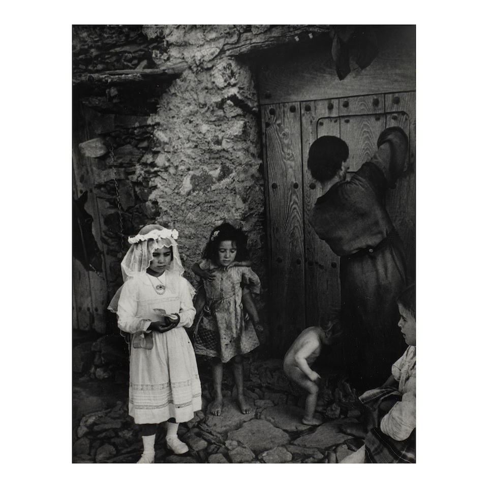 W. Eugene Smith (1918-1978); 'Spain - First Communion';: W. Eugene Smith (1918-1978) 'Spain - First Communion', 1950 Gelatin silver print, printed before 1978; signed with a stylus on the image, mounted, signed, titled, and dated in pencil on the mount. 12