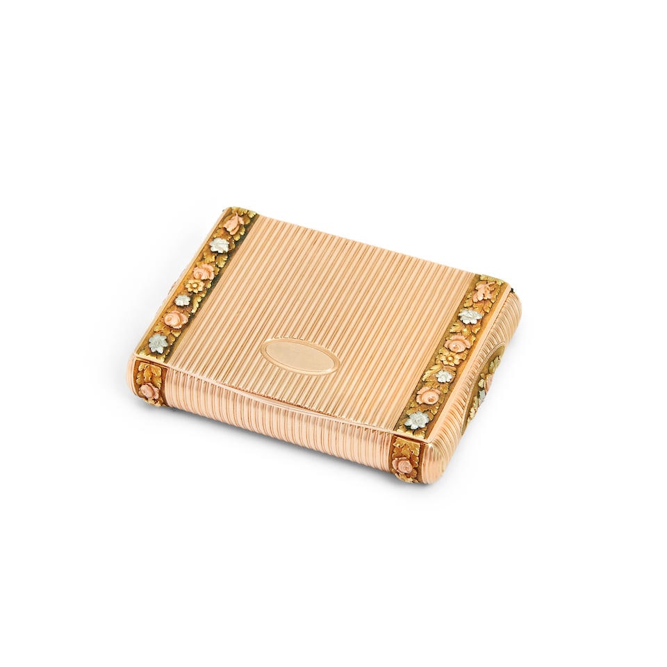 An early 19th century German vari-coloured gold box maker's mark GT, flanked by a sunray mark an... (1 of 2)