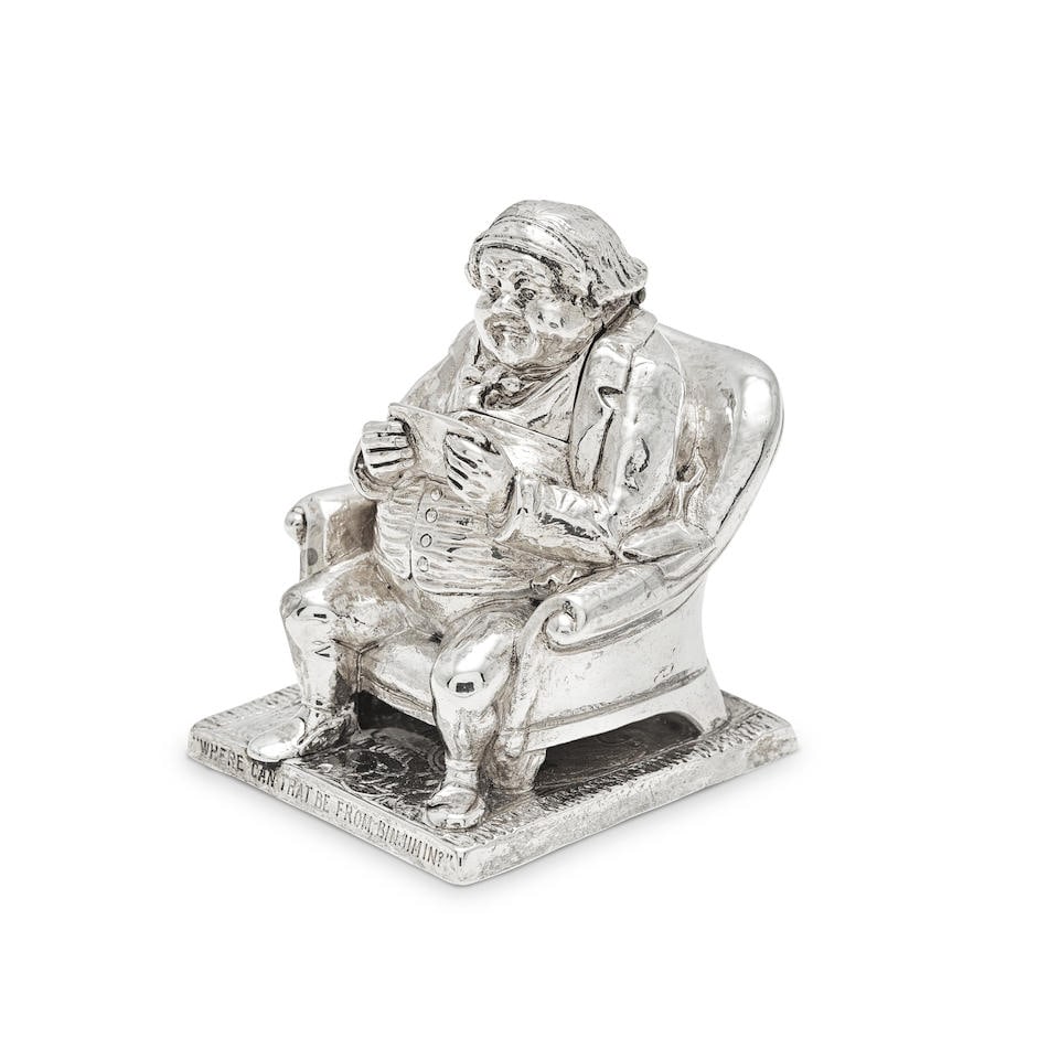 An unusual Victorian novelty silver condiment / inkwell probably Thomas Johnson II, London 1885: An unusual Victorian novelty silver condiment / inkwell probably Thomas Johnson II, London 1885 Realistically modelled as a portly Gentleman reading a 'double-headed letter' whilst seated in an uphols