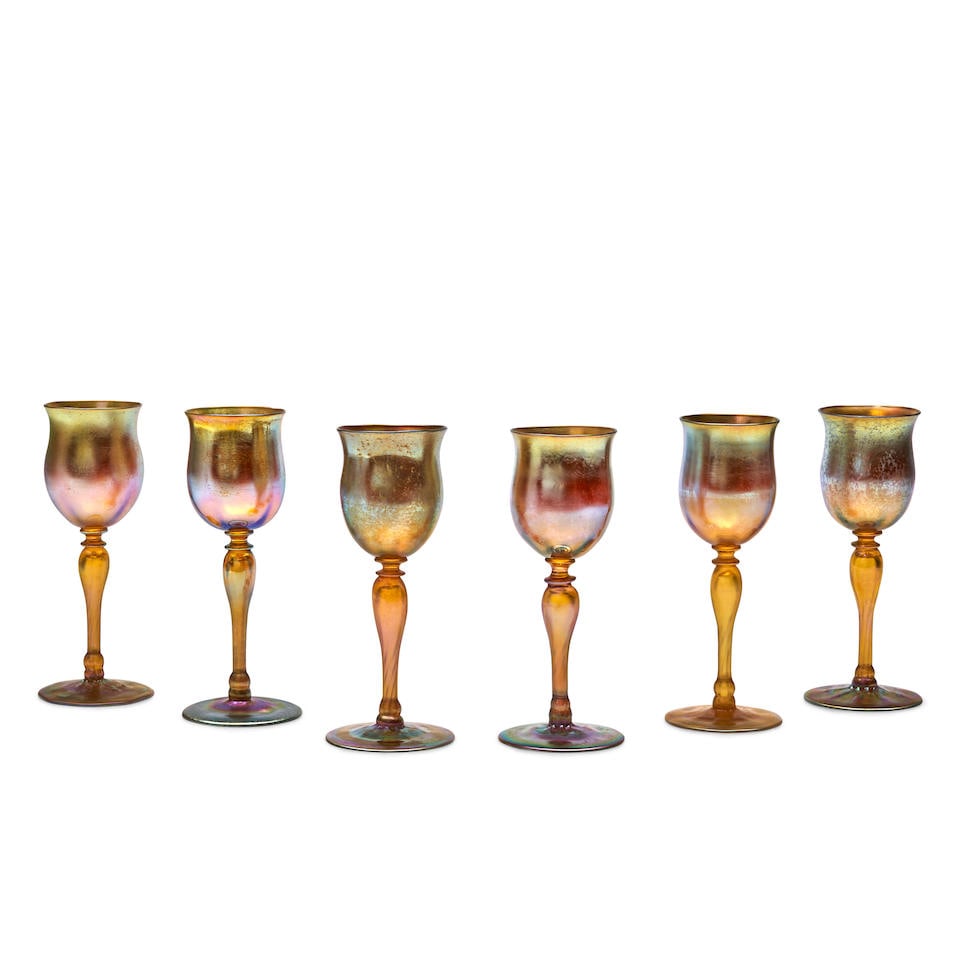 SIX TIFFANY STUDIOS GOLD FAVRILE WINE GLASSES New York, New York, early 20th century, all with i...: SIX TIFFANY STUDIOS GOLD FAVRILE WINE GLASSES New York, New York, early 20th century, all with incised marks 'L.C.T.' and production numbers, ht. 7 1/8 in. Footnotes: Provenance Property from a Mid-At
