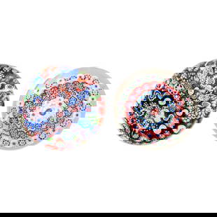 Two Baccarat millefiori paperweights, circa 1845-50: Two Baccarat millefiori paperweights, circa 1845-50 Comprising a closepack weight with an assortment of tightly packed canes in the more sombre, earlier palette, without the turquoise-blue found in mo