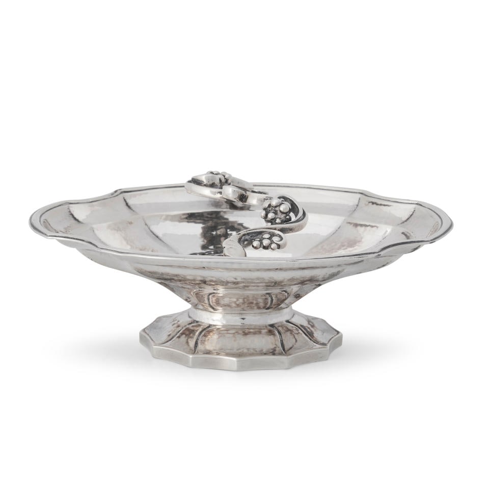 Georg Jensen Sterling Silver Sugar Bowl No. 347B,: Georg Jensen Sterling Silver Sugar Bowl No. 347B, Denmark, 1933-1944, of serpentine form with paneled construction on a dodecagon foot, ht. 1/2, lg. 5 in., approx. 3.75 troy oz. For further informatio