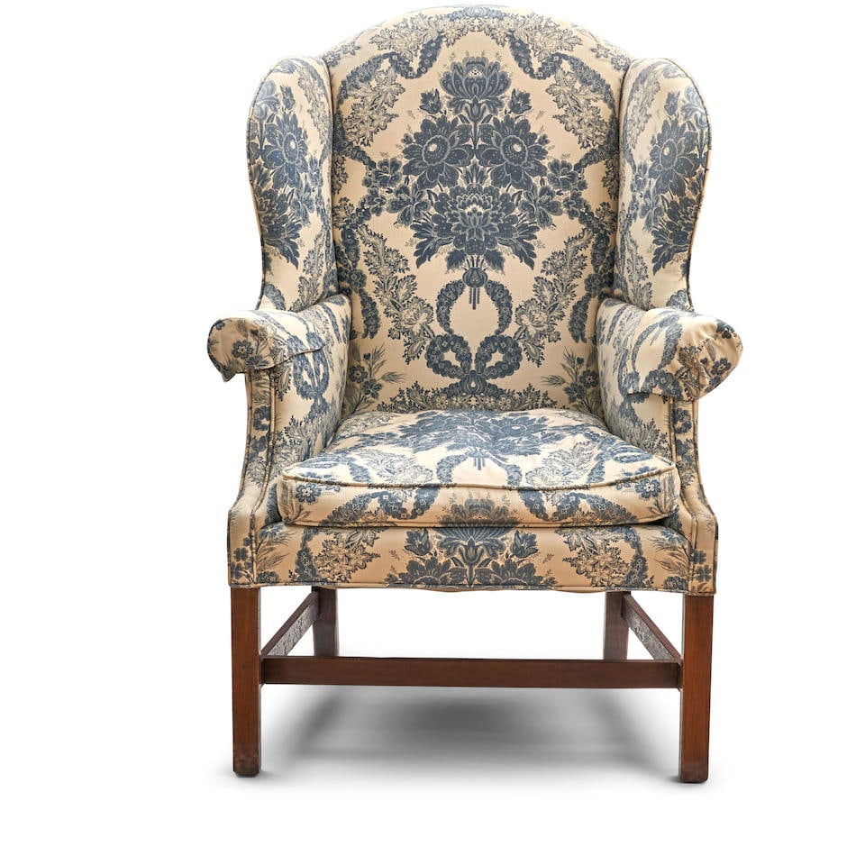 George III Wingback Armchair, late 19th/ early 20th century,: George III Wingback Armchair, late 19th/ early 20th century, shaped back leading to long scrolled arms and standing on square taper mahogany legs,ht. 45 1/2, wd. 31, dp. 24 1/2, seat ht. 19 1/2 in. Fo