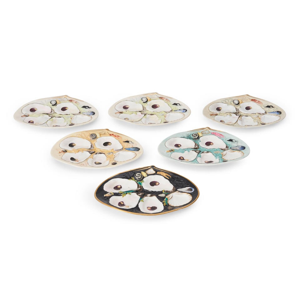 Six Union Porcelain Works Oyster Plates, Greenpoint, NY, c. 1880,: Six Union Porcelain Works Oyster Plates, Greenpoint, NY, c. 1880, retailed by Tiffany & Co., polychrome enameled in a variety of enamel colors, printed marks, lg. 8 3/4 in. Lot to be sold without res