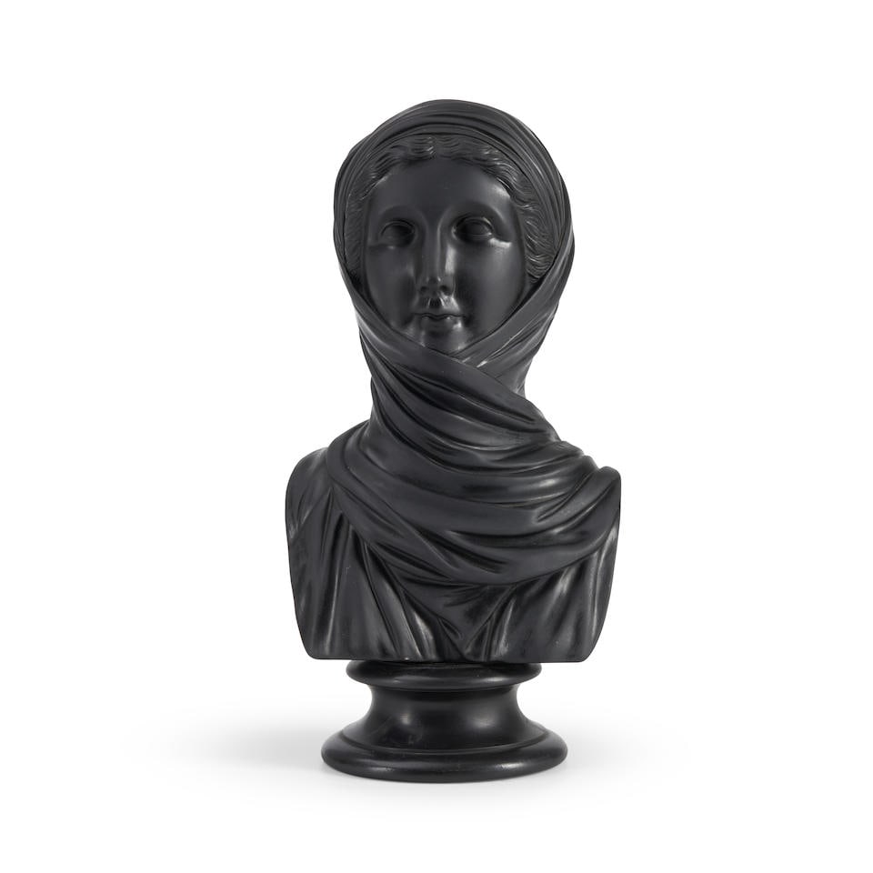 Wedgwood Black Basalt Portrait Bust of Vestal, England, 19th century,: Wedgwood Black Basalt Portrait Bust of Vestal, England, 19th century, mounted atop a waisted circular socle, impressed title and mark, ht. 11 in. Footnotes: Provenance: Hightower Collection. Lot to be
