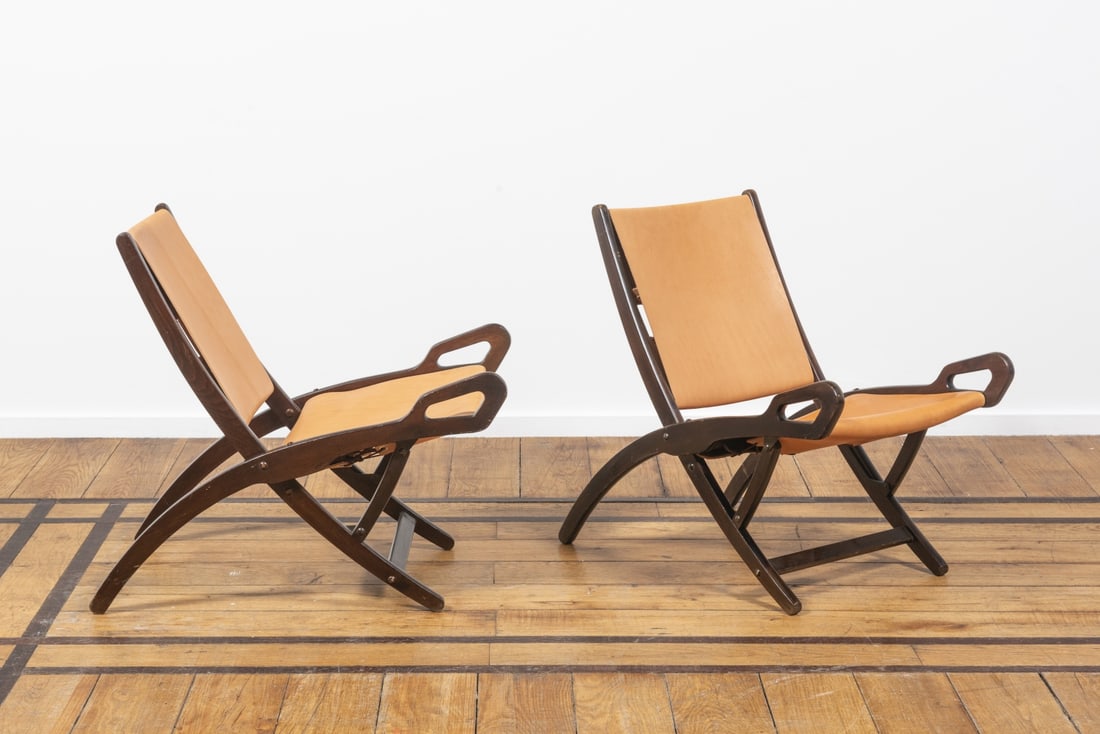 GIO PONTI (1891-1979) Paire de chaises pliantes Ninfea: GIO PONTI (1891-1979) Paire de chaises pliantes Ninfea Création circa 1958 Edition Fratelli Reguitti Estampille de l'éditeur Acajou et cuir Paar 'Ninfea' klapstoelen Ontwerp omstreeks 1958 U