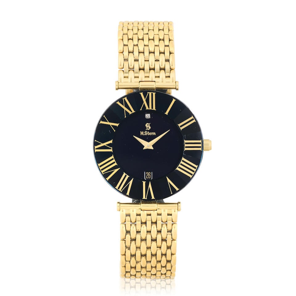 H.Stern. An 18K gold quartz calendar bracelet watch Circa 1990: H.Stern. An 18K gold quartz calendar bracelet watch Date: Circa 1990 Movement: 6-jewel ETA Cal.255.441 quartz Dial: Black Case: Brushed and polished round Strap/Bracelet: 18K gold brick link Buckle/Cl