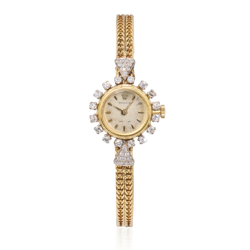 Rolex. A lady's 18K gold manual wind cocktail watch  Precision, Circa 1960 (1 of 3)