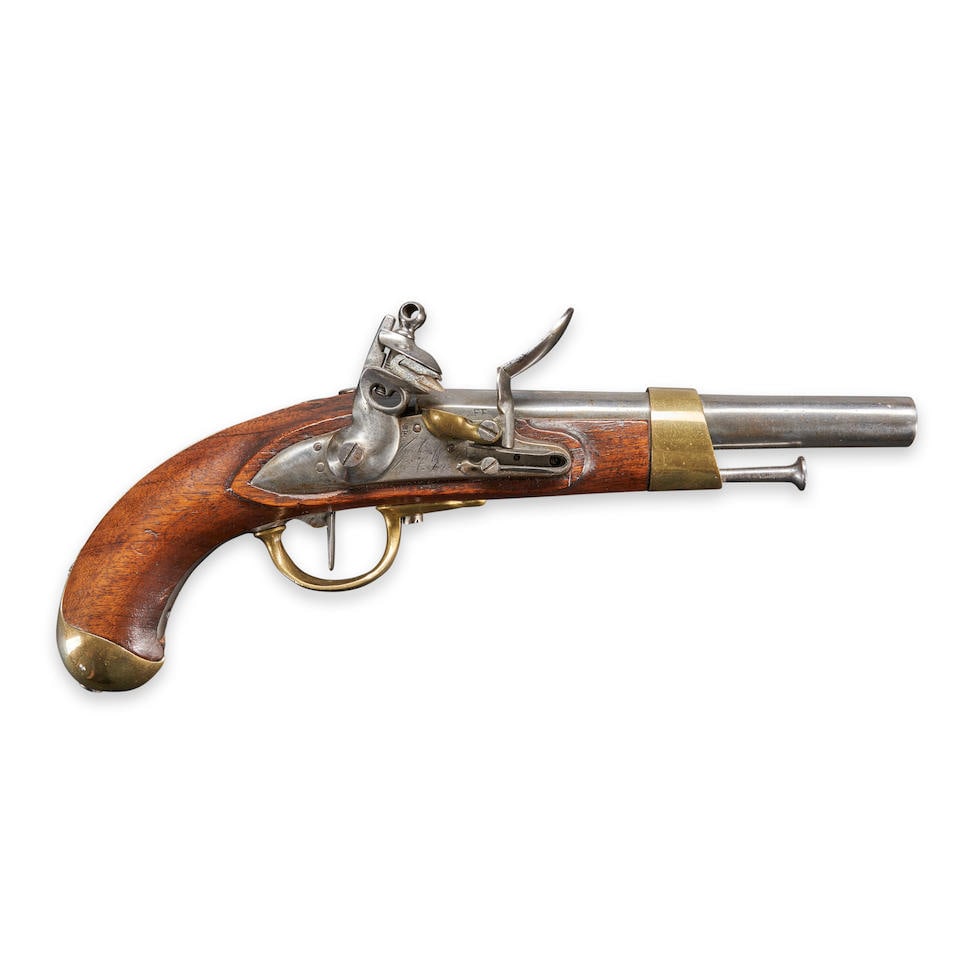 A FRENCH MODEL AN XIII FLINTLOCK CAVALRY PISTOL,: A FRENCH MODEL AN XIII FLINTLOCK CAVALRY PISTOL, Maubeuge, 1813. 8 in., .69 caliber round barrel with octagonal breech; lock plate with pointed tail, engraved 'Maubeuge/Manuf. Imple.' below the brass 