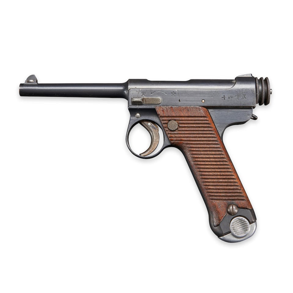 A JAPANESE NAMBU TYPE 14 SEMI AUTOMATIC PISTOL, Curio or Relic firearm: A JAPANESE NAMBU TYPE 14 SEMI AUTOMATIC PISTOL, Kokura Arsenal, May 1932. Serial number 24572, 8x22mm Nambu caliber, blued steel barrel with blade front sight; slide with proper Japanese markings and 