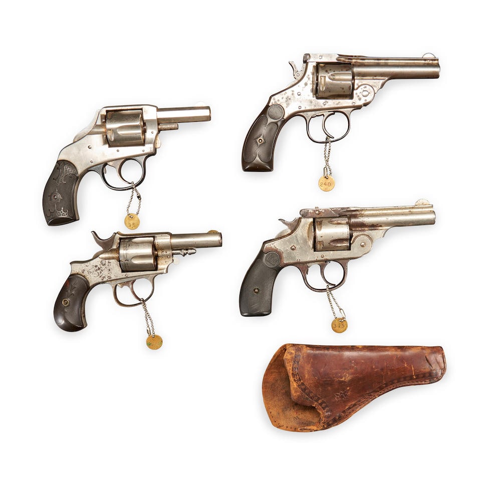 FOUR DOUBLE ACTION REVOLVERS, Curio or Relic firearm: FOUR DOUBLE ACTION REVOLVERS, late 19th/early 20th century. A Harrington & Richardson Safety Hammer Double Action revolver, serial number 80994, .38 S&W. caliber, nickel-plated octagonal barrel, cylin