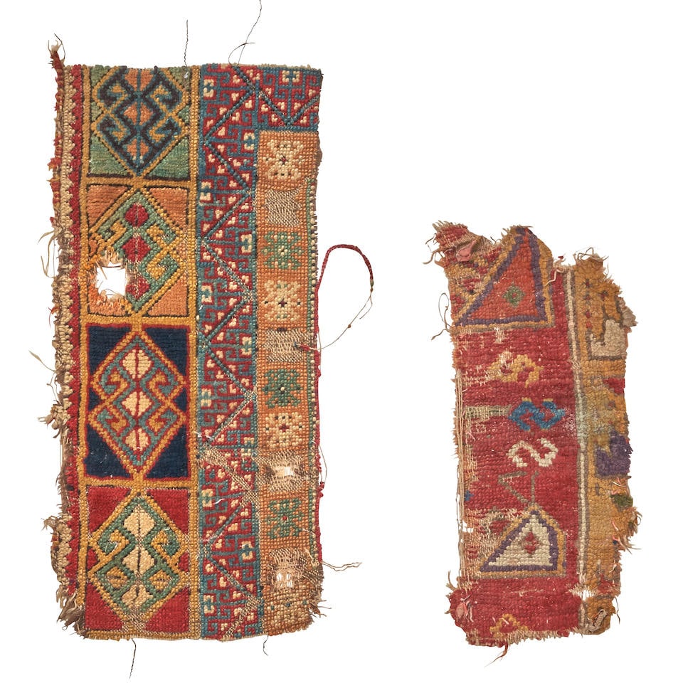 TWO ANATOLIAN RUG FRAGMENTS 9 in. x 1 ft. 7 in. and 1 ft. x 2 ft. 2 in.: TWO ANATOLIAN RUG FRAGMENTS c. early 19th century or earlier Provenance: The Jim Dixon Collection 9 in. x 1 ft. 7 in. and 1 ft. x 2 ft. 2 in. For further information on this lot please visit Bonhams.c