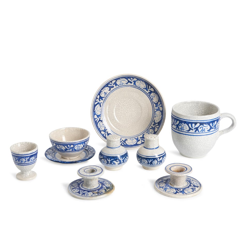 NINE PIECES OF DEDHAM POTTERY 'RABBIT' TABLEWARE: NINE PIECES OF DEDHAM POTTERY 'RABBIT' TABLEWARE Dedham, Massachusetts, 1929-1943, salt and pepper shakers, partial post-1929 ink stamps, ht. 2 3/4, single egg cup, unmarked, ht. 2 1/2, plate, post-19