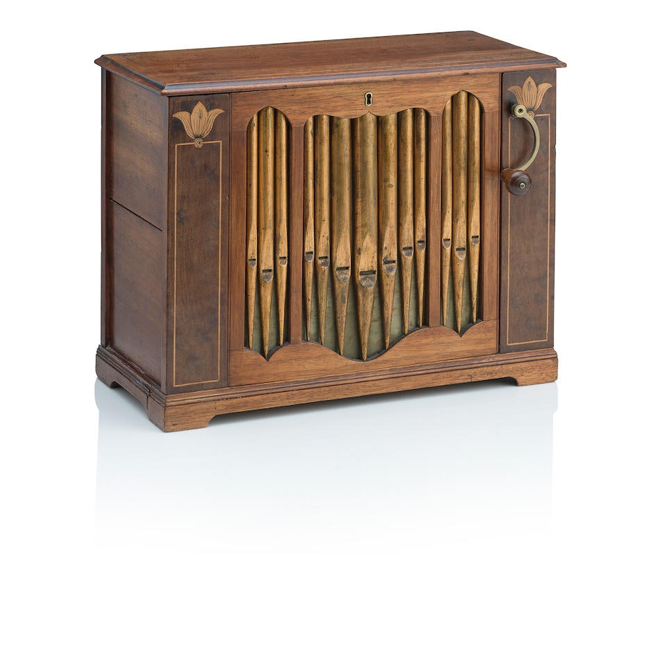 A 19th Century mahogany table organ The barrel inscribed 'made and sold at Longman & Co Music sh...: A 19th Century mahogany table organ The barrel inscribed 'made and sold at Longman & Co Music shop, No.26 Cheapside London' Contained within an inlaid mahogany case, with one barrel playing eight tune