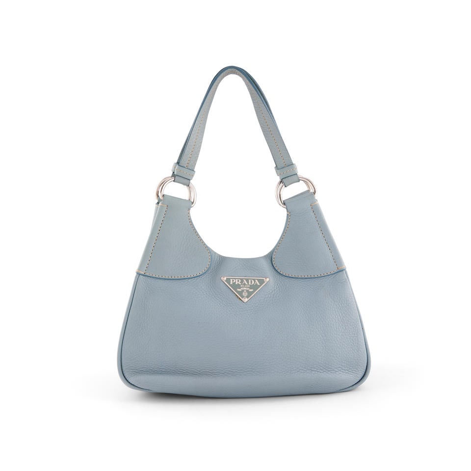 Prada: a Pale Blue Calfskin Hobo Shoulder Bag: Prada: a Pale Blue Calfskin Hobo Shoulder Bag Creative Director: Miuccia Prada Silver-tone hardware 30cm wide, 16cm high, 11cm deep, 23cm handle drop Footnotes: CONDITION REPORT Condition Grade B+ App