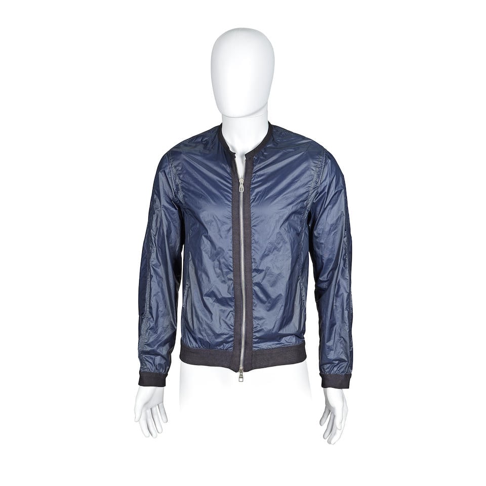 Louis Vuitton: a Navy Blue Collarless Nylon Jacket Spring/Summer 2010: Louis Vuitton: a Navy Blue Collarless Nylon Jacket Spring/Summer 2010 Creative Director: Kim Jones One-off sample piece created for the Spring/Summer 2010 men's line Tailor's marks visible at the inte