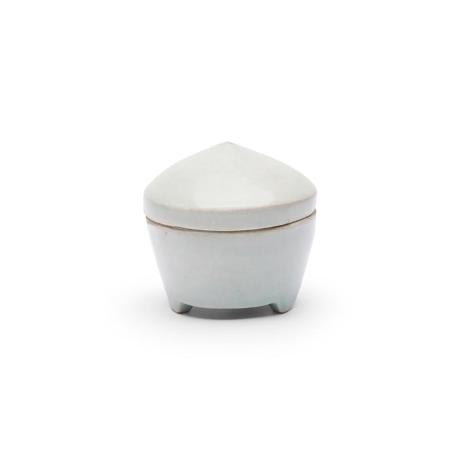 Bernard Leach (British, 1887-1979) Incense Pot, circa 1965 height: 8.0cm: Bernard Leach (British, 1887-1979) Incense Pot, circa 1965 impressed BL and Leach Pottery seals Porcelain incense pot with a pale blue glaze, with cut feet and a lid culminating at a point height: 8.0