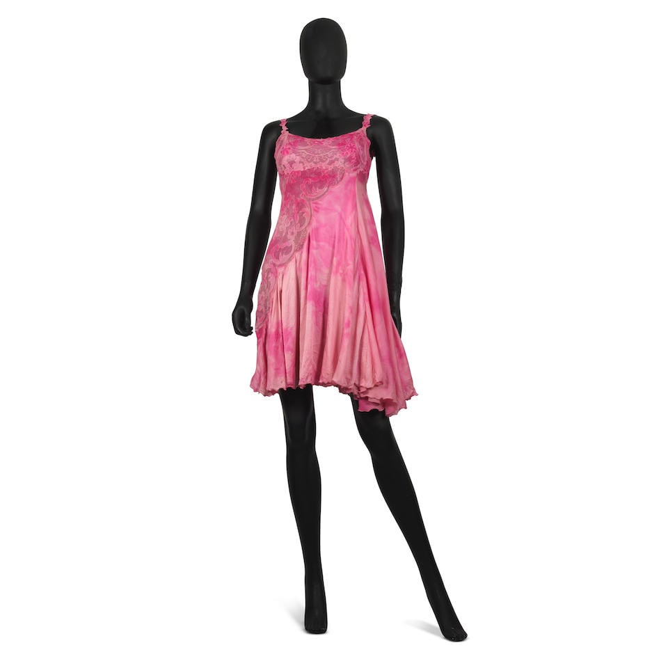 Gianni Versace: a Pink Babydoll Dress Spring/Summer 1994: Gianni Versace: a Pink Babydoll Dress Spring/Summer 1994 Creative Director: Gianni Versace Runway Look 68 Pink crinkled silk slip dress with tonal lace feature Labelled size IT 40 Footnotes: