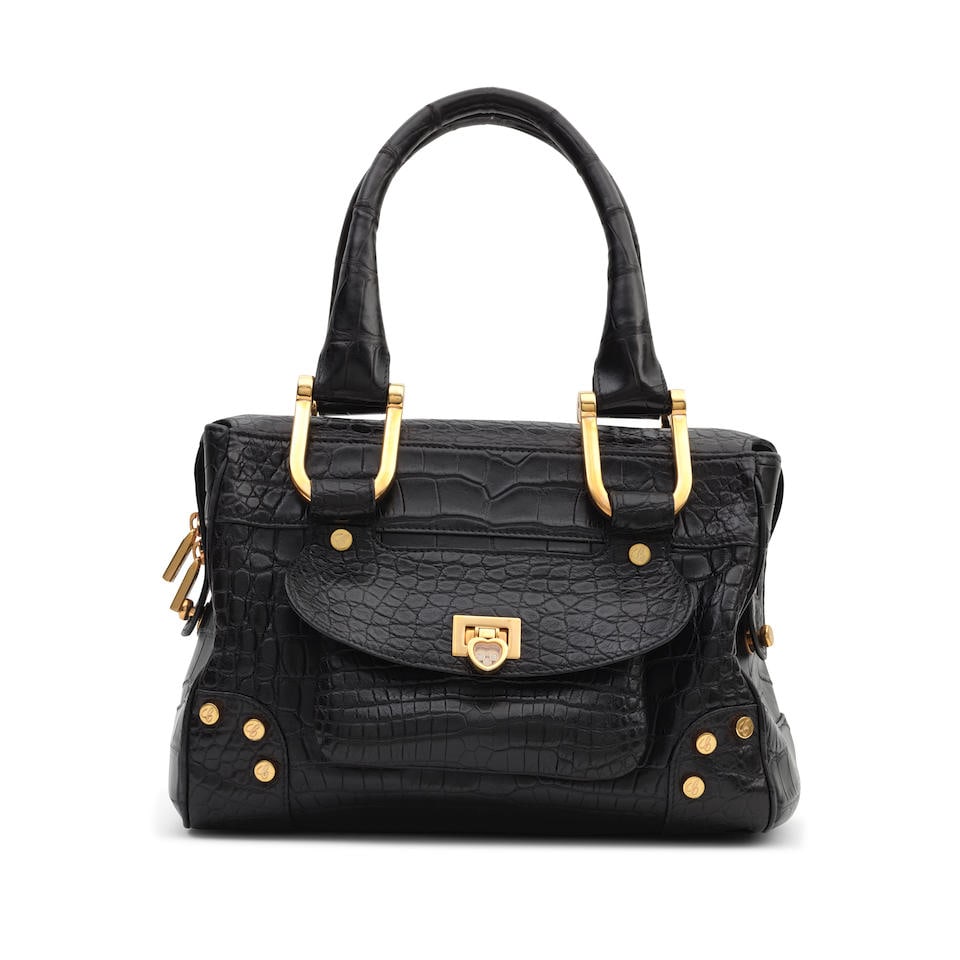 Chopard: a Matte Black Alligator Caroline Bowler Bag 2010s, Limited Edition 14/17 (includes card): Chopard: a Matte Black Alligator Caroline Bowler Bag 2010s, Limited Edition 14/17 Features 'Happy Diamond' heart shaped lock with floating diamonds, and gold-tone hardware 27cm, 18cm high, 14cm deep,