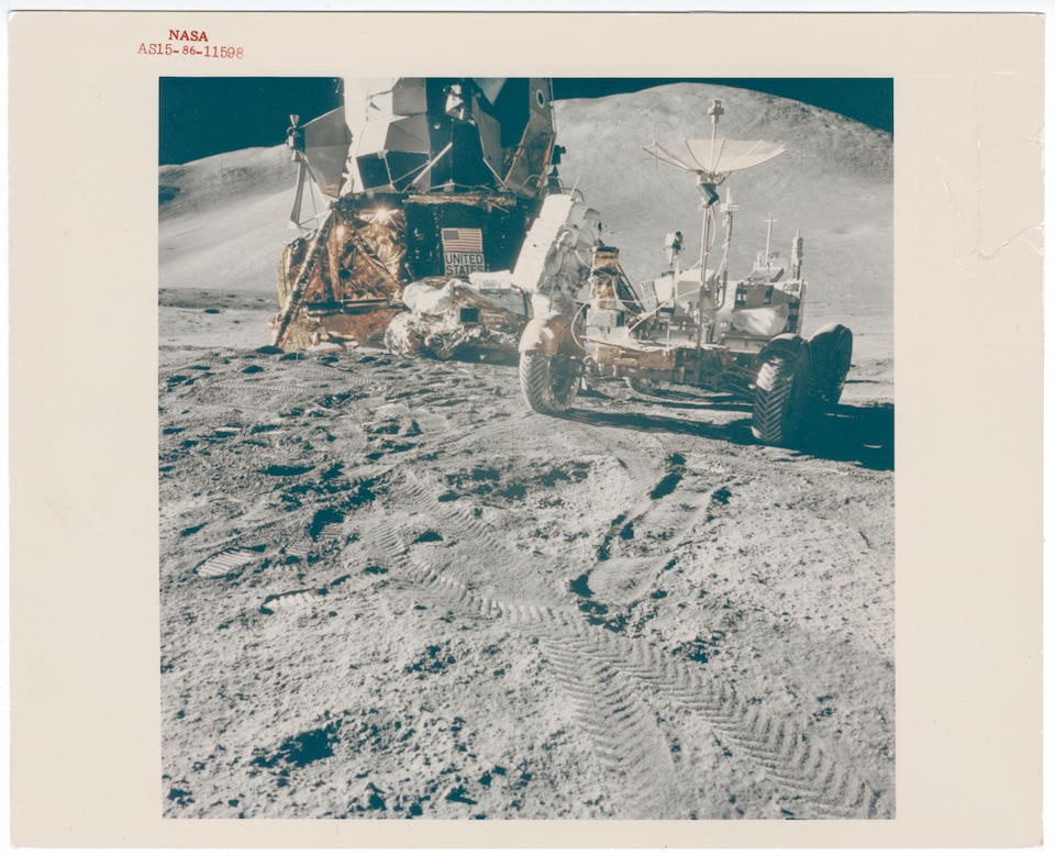 [Apollo 15] JAMES IRWIN, THE FIRST LUNAR ROVER, AND THE LM FALCON AT HADLEY BASE David Scott, 26...: [Apollo 15] JAMES IRWIN, THE FIRST LUNAR ROVER, AND THE LM FALCON AT HADLEY BASE David Scott, 26 July - 7 August 1971, EVA 1 Printed 1971. Vintage chromogenic print on fibre-based Kodak paper [NASA im