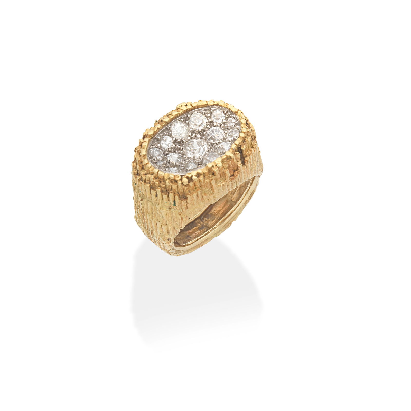 GRIMA: DIAMOND-SET RING,: GRIMA: DIAMOND-SET RING, 1967 Of abstract design, the 18 carat gold textured ring with a concave plaque of brilliant-cut diamonds, diamonds approx. 1.10cts total, signed Grima, maker's mark HJCo., Lon