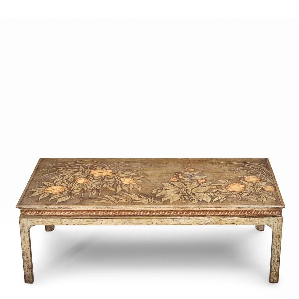 MAX KUEHNE (1880-1968) COFFEE TABLE United States, c. 1940, silver leaf and polychrome on gessoe...: MAX KUEHNE (1880-1968) COFFEE TABLE United States, c. 1940, silver leaf and polychrome on gessoed and carved wood, incised signature 'Max Kuehne,' ht. 17, wd. 48, dp. 20 in. For further information on