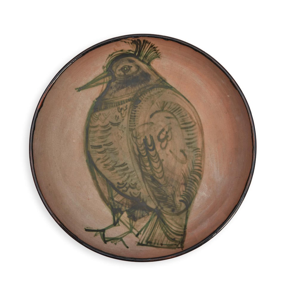 JACQUES INNOCENTI (1926-1961) CHARGER DEPICTING A BIRD Vallauris, France, dated 1957, glazed cer...: JACQUES INNOCENTI (1926-1961) CHARGER DEPICTING A BIRD Vallauris, France, dated 1957, glazed ceramic, marked 'J. Innocenti Vallauris 1957,' dia. 12 1/2 in. Footnotes: Private Collection, St. Louis, Mi