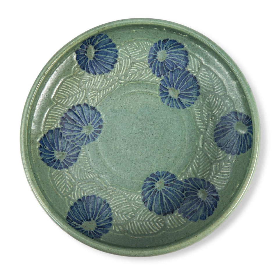 ÉMILE LENOBLE (1875-1940) CHARGER France, c. 1920, molded and glazed stoneware, partial art...: EMILE LENOBLE (1875-1940) CHARGER France, c. 1920, molded and glazed stoneware, partial artist's stamp mark and ink mark '7778,' ht. 1 3/4, dia. 10 1/4 in. Lot to be sold without reserve. For further