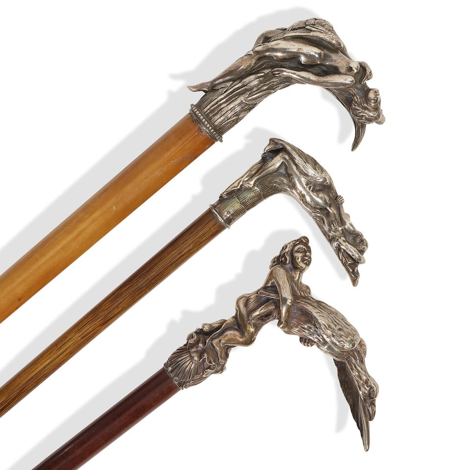 THREE ART NOUVEAU SILVER LEDA AND THE SWAN WALKING CANESLate 19th-20th centuries (1 of 2)