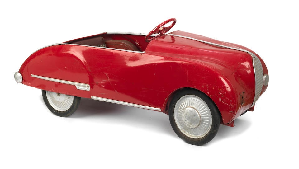 An 'Alfa Romeo' child's pedal car, 1951,: An 'Alfa Romeo' child's pedal car, 1951, believed Italian, in the form of a post-War Alfa Romeo, steel frame chassis with pressed steel body resprayed red, with brightwork and rear number plate '1951.