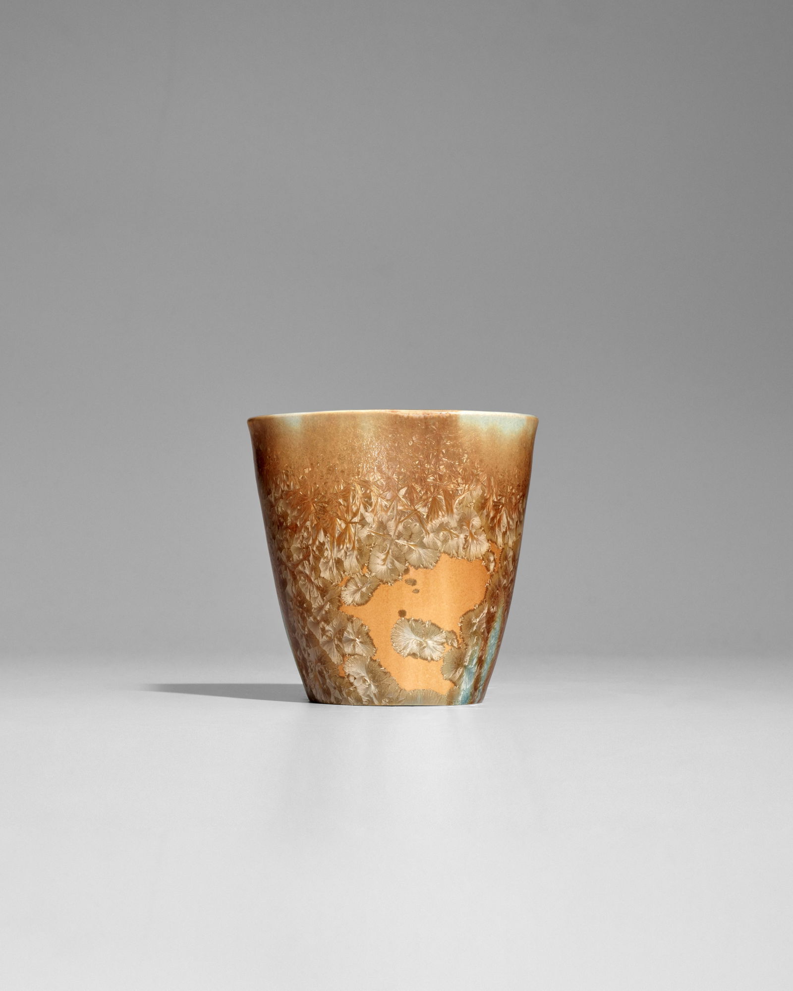 TAXILE DOAT (1851-1938) FOR UNIVERSITY CITY Vase1913porcelain with crystalline glaze, glaze mark...: TAXILE DOAT (1851-1938) FOR UNIVERSITY CITY Vase 1913 porcelain with crystalline glaze, glaze mark 'U.C 1913 31' height 3 1/2in (9cm); width 3 1/2in (9cm) Footnotes: Provenance Lillian Nassau, 1975