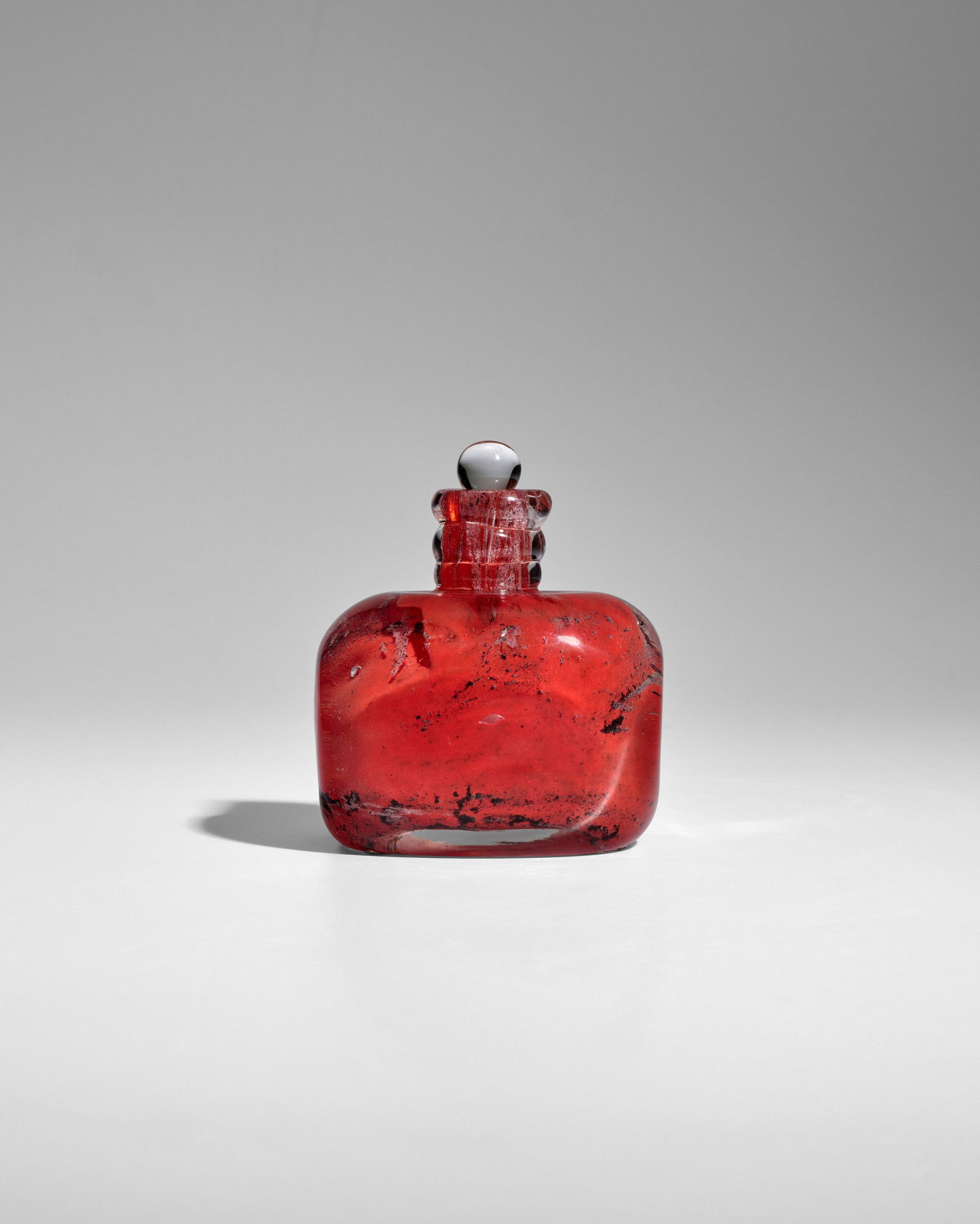 MAURICE MARINOT (1882-1960) Flacon with Stopper1930model no. 1806, internally decorated glass, e...: MAURICE MARINOT (1882-1960) Flacon with Stopper 1930 model no. 1806, internally decorated glass, engraved 'marinot', paper label 'No.9 Flacon Marinot' and '1806' height 4 1/2in (11.5cm); width 3 3/4in