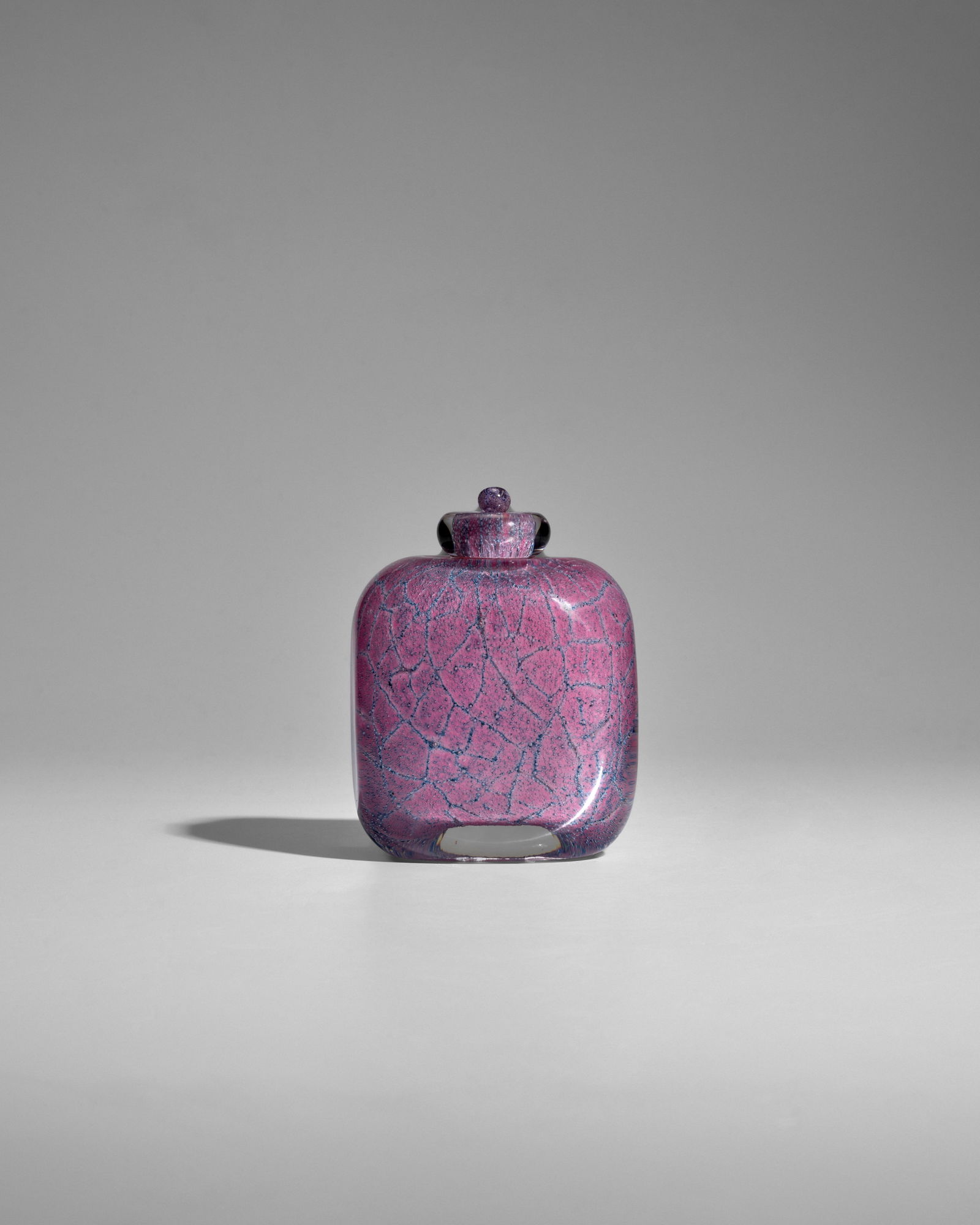 MAURICE MARINOT (1882-1960) Flacon Méplat with Stopper1924model no. 808, internally decorat...: MAURICE MARINOT (1882-1960) Flacon Meplat with Stopper 1924 model no. 808, internally decorated craquele glass, engraved 'marinot' height 4 1/2in (11.5cm); width 3 1/4in (8.2cm) Footnotes: Bonhams wou