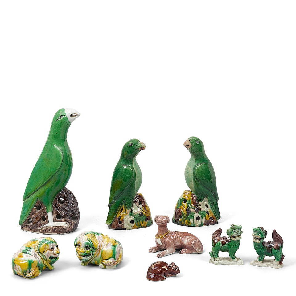 A GROUP OF NINE SMALL SANCAI- AND AUBERGINE-GLAZED BISCUIT FIGURES OF ANIMALS Kangxi period - 18...