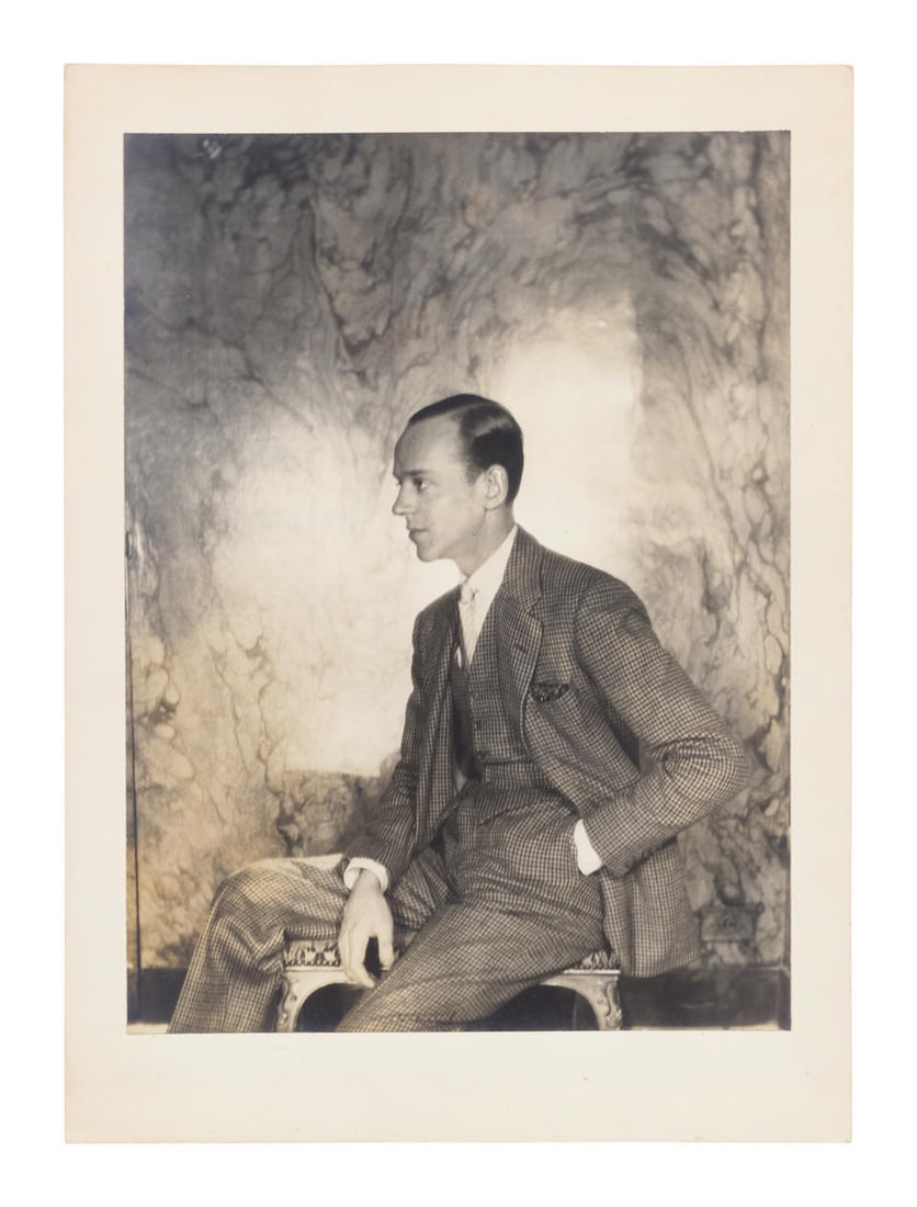 Cecil Beaton (British, 1904-1980); Fred Astaire;: Cecil Beaton (British, 1904-1980) Fred Astaire, circa 1930 Seated in profile, circa 1930, gelatin silver print, probably printed later, mounted to card, the card with photographer's ink-stamp credit t