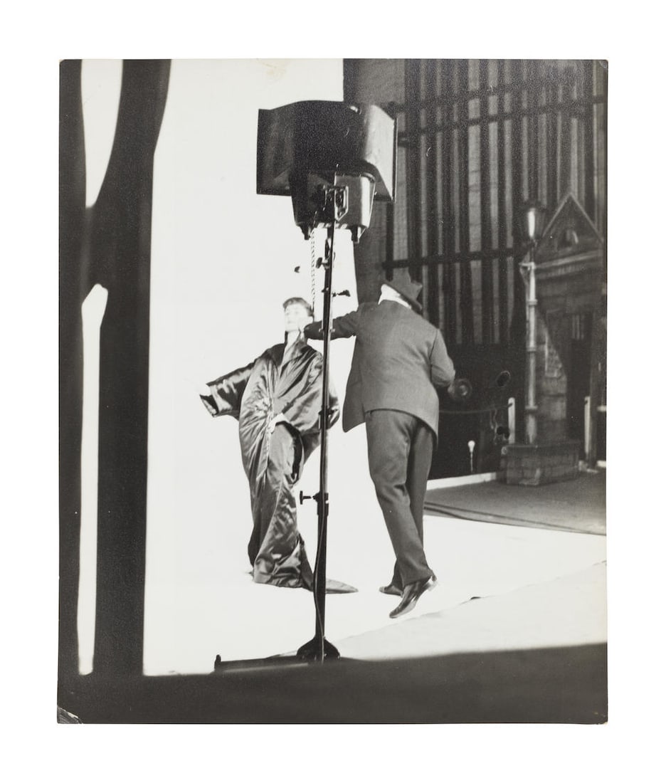 Attributed to Geoffrey Sawyer (British, 1933-2022); Cecil Beaton's My Fair Lady; (6): Attributed to Geoffrey Sawyer (British, 1933-2022) Cecil Beaton's My Fair Lady, circa 1956-58 Depicting Beaton photographing a member of the My Fair Lady chorus, the model wearing the opera coat from