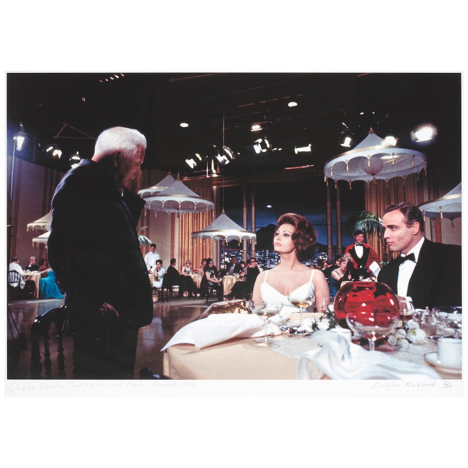 Douglas Kirkland (1934-2022): Charlie Chaplin, Sophia Loren and Marlon Brando on the set for A C...: Douglas Kirkland (1934-2022): Charlie Chaplin, Sophia Loren and Marlon Brando on the set for A Countess from Hong Kong, Pinewood Studios, London, 1966, printed later, no.5/25, signed, numbered and dat